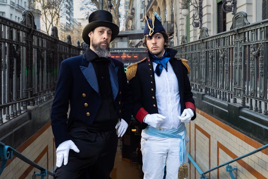 Two men in historical costumes pose at a Buenos Aires subway entrance.