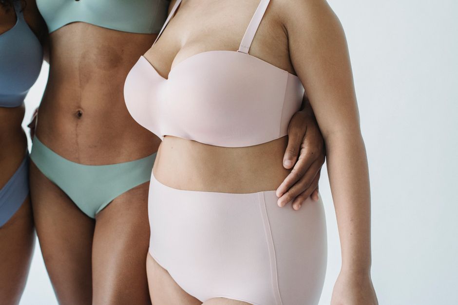 Three women showcasing colorful and diverse body types in underwear.